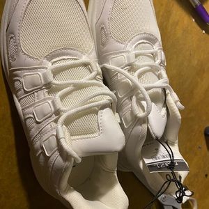 White athletic sneakers for women